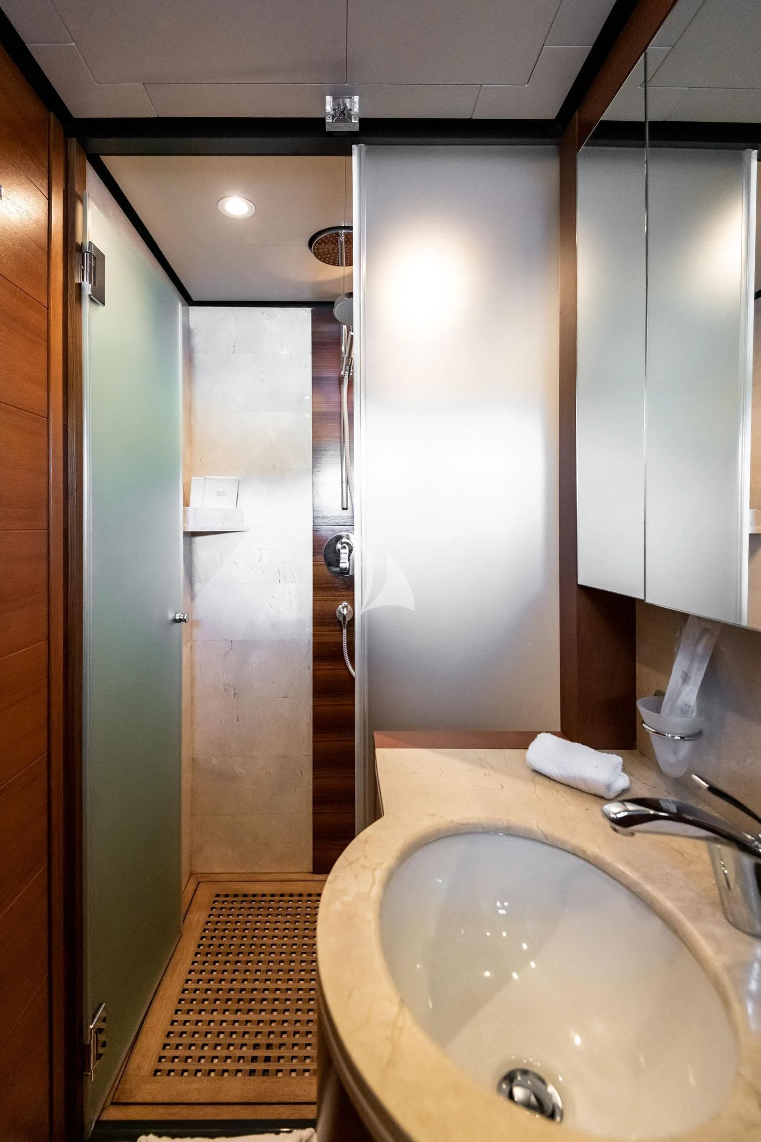 a bathroom with a sink and a mirror aboard LOANA Yacht for Sale