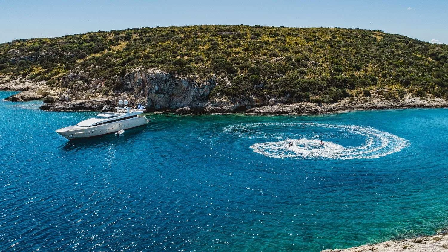 a boat in the water aboard LOANA Yacht for Sale