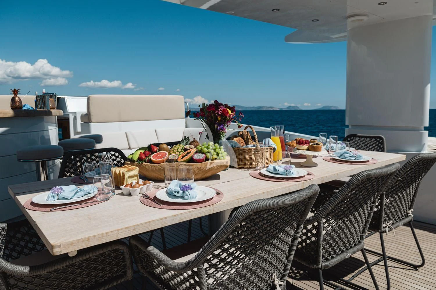 a table with food on it aboard LOANA Yacht for Sale