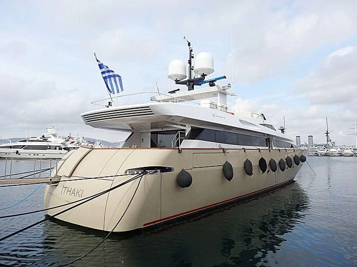 a large white boat in a harbor aboard LOANA Yacht for Sale