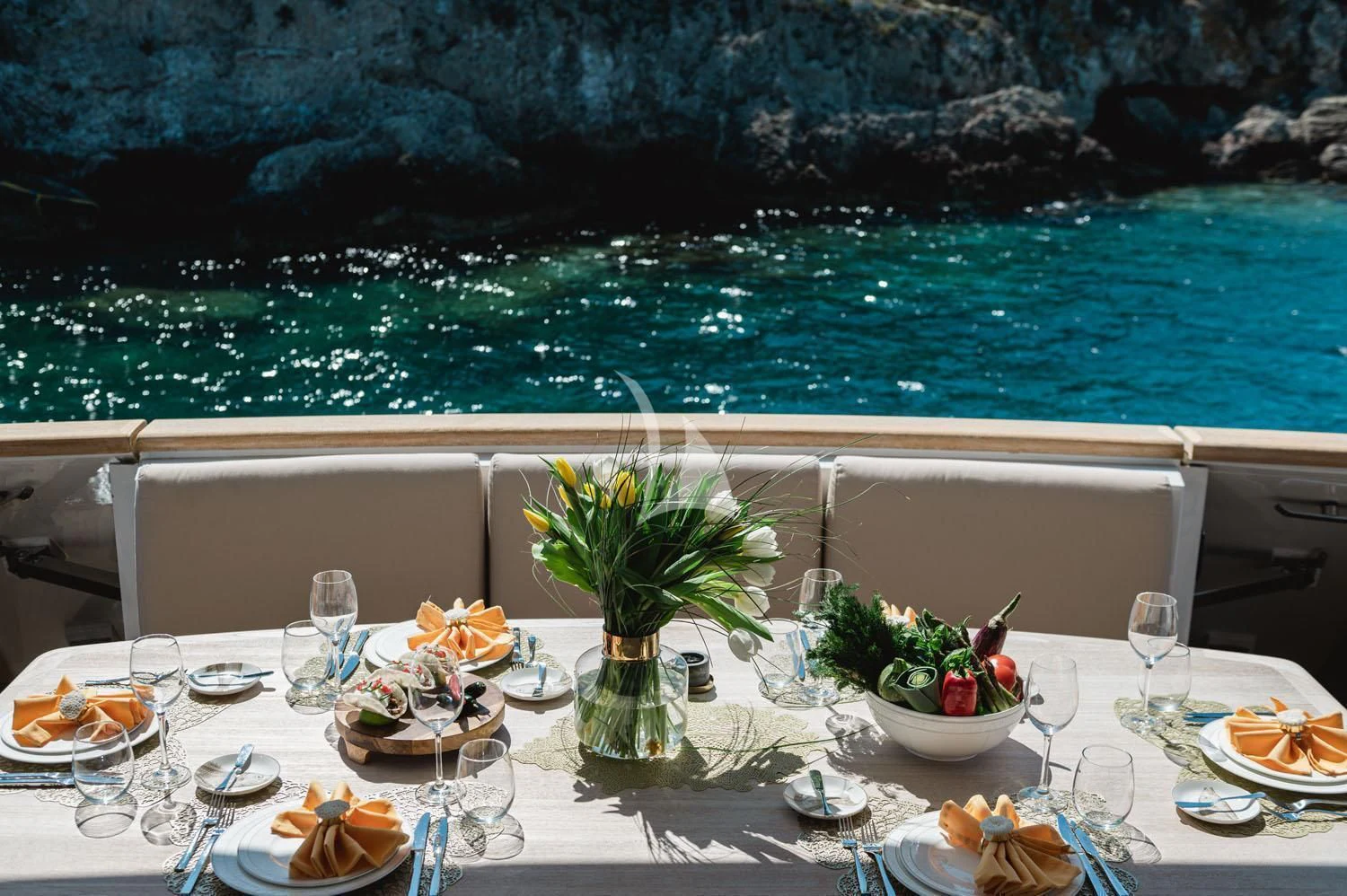 a table with food on it aboard LOANA Yacht for Sale