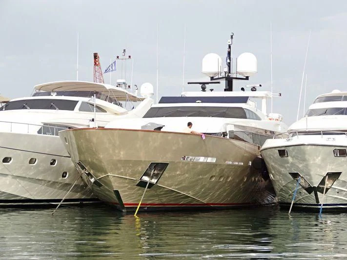 several boats in a harbor aboard LOANA Yacht for Sale