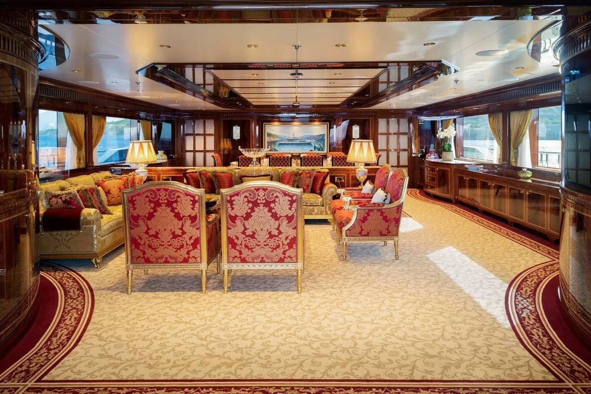 a large living room with a large window aboard COCKTAILS Yacht for Sale