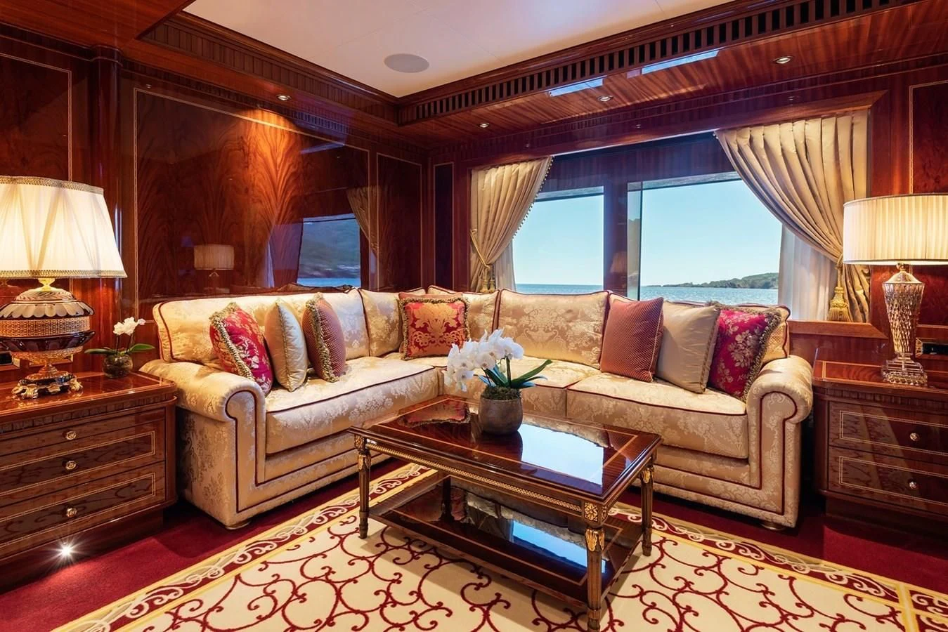 a living room with a large window aboard COCKTAILS Yacht for Sale