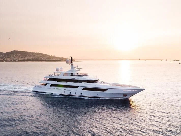 a white boat in the water aboard COCKTAILS Yacht for Sale