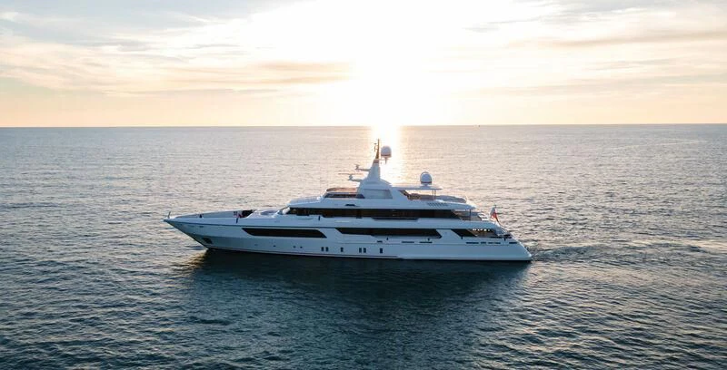 a white yacht in the water aboard COCKTAILS Yacht for Sale