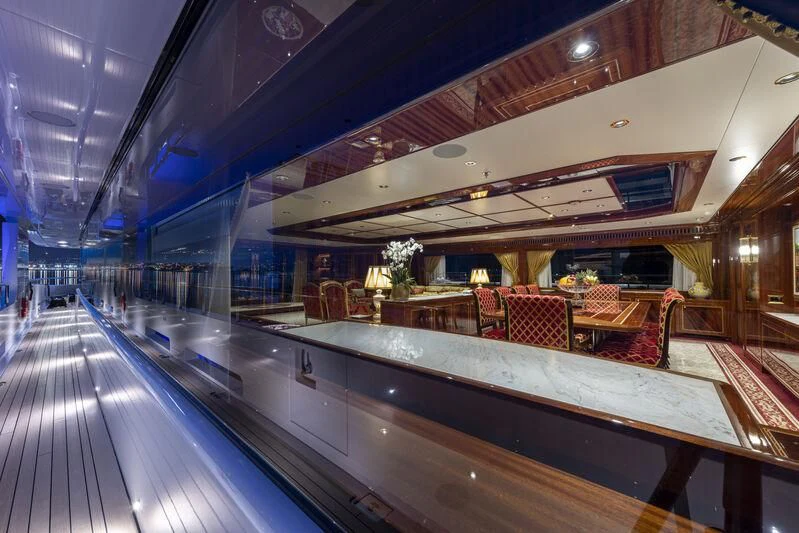 a large room with a large pool table and chairs aboard COCKTAILS Yacht for Sale