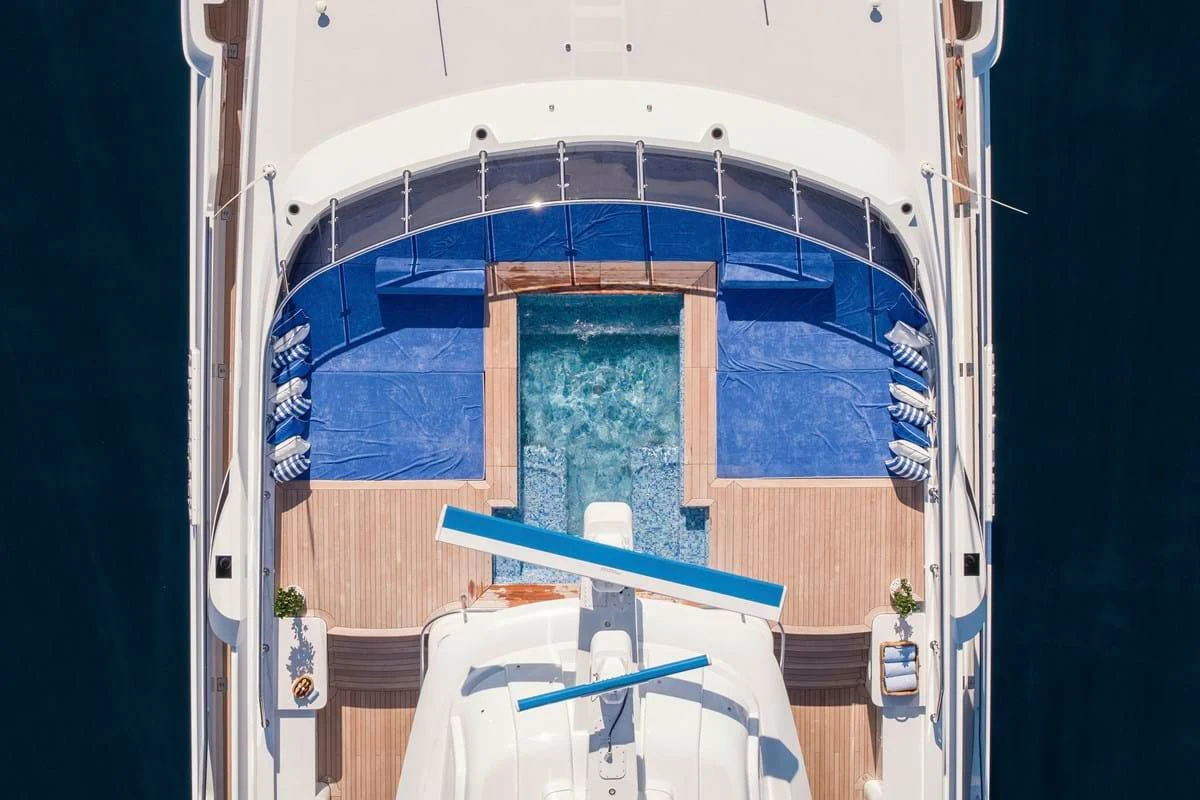 a view of a house through a window aboard COCKTAILS Yacht for Sale