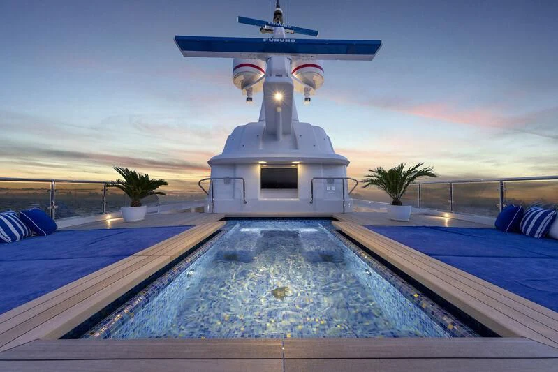 a helicopter flying over a building aboard COCKTAILS Yacht for Sale