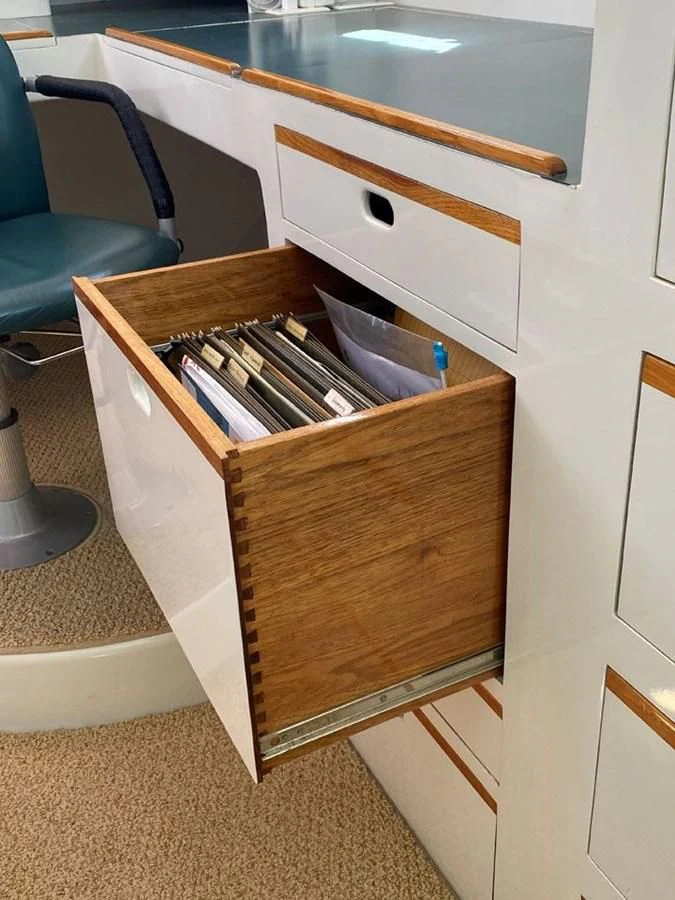 a wooden box with a black lid aboard ROUTE 66 Yacht for Sale