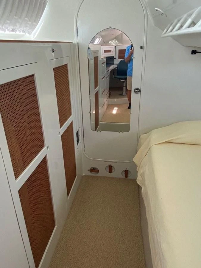 a person sitting in a chair aboard ROUTE 66 Yacht for Sale