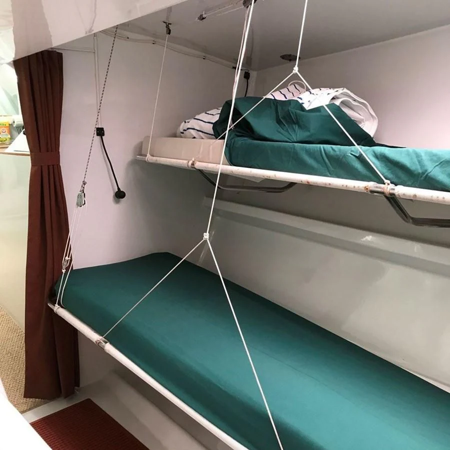 a boat with a blue cover aboard ROUTE 66 Yacht for Sale