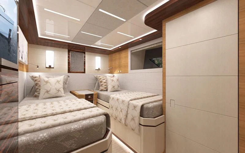 a room with two beds aboard VOYAGER Yacht for Sale