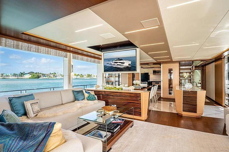 a living room with a large window aboard VOYAGER Yacht for Sale