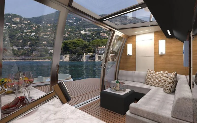 a room with a view of a lake and a deck aboard VOYAGER Yacht for Sale