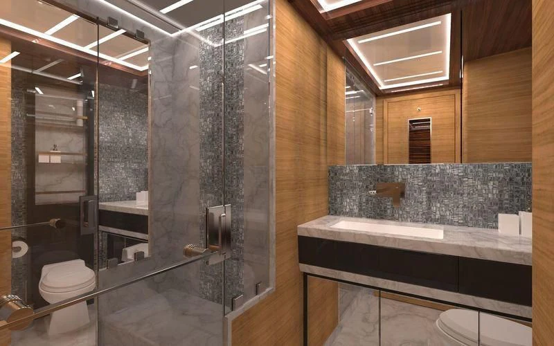 a bathroom with a glass shower aboard VOYAGER Yacht for Sale