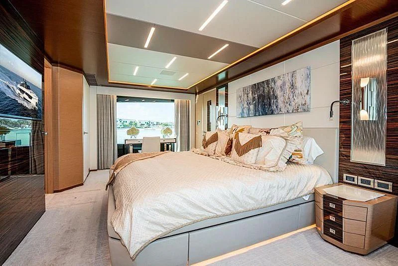 a bedroom with a large bed aboard VOYAGER Yacht for Sale