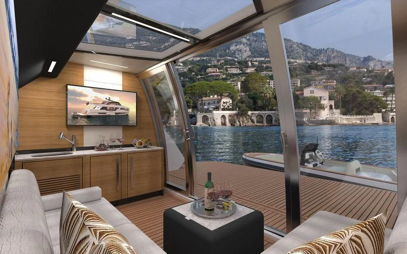 a room with a view of a city and water aboard VOYAGER Yacht for Sale