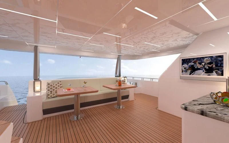 a room with a table and chairs aboard VOYAGER Yacht for Sale