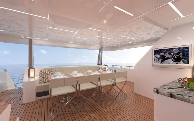 a room with a table and chairs aboard VOYAGER Yacht for Sale