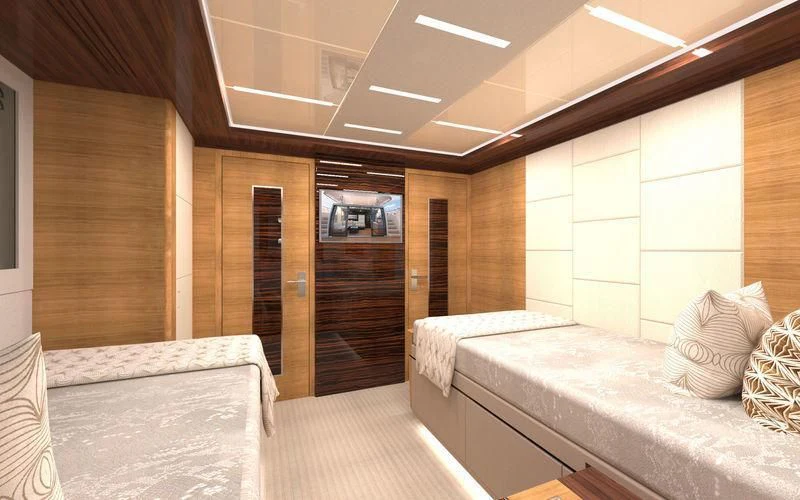 a room with two beds aboard VOYAGER Yacht for Sale