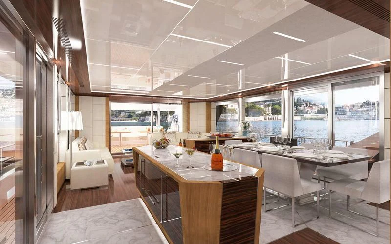 a large room with a table and chairs aboard VOYAGER Yacht for Sale