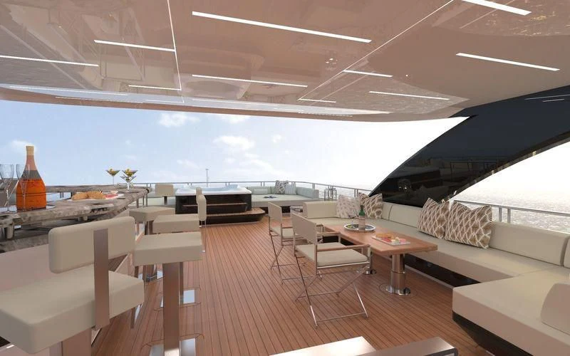 a room with a large window and a table with chairs and a large window aboard VOYAGER Yacht for Sale