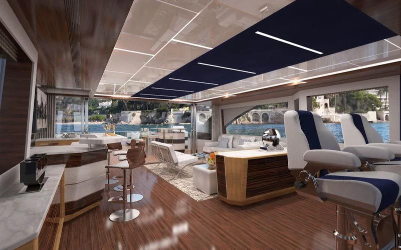 a room with a view of the water and the deck aboard VOYAGER Yacht for Sale