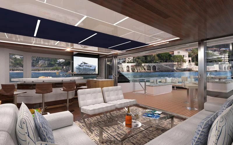 a living room with a large swimming pool aboard VOYAGER Yacht for Sale