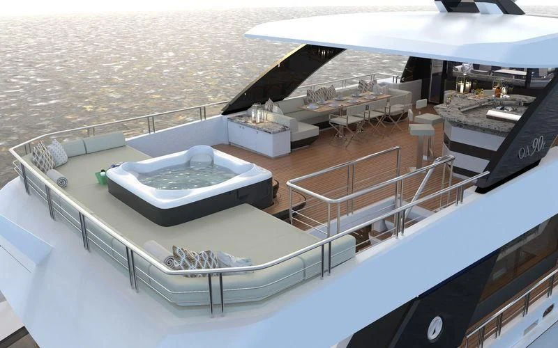 a deck with a view of a city and water aboard VOYAGER Yacht for Sale