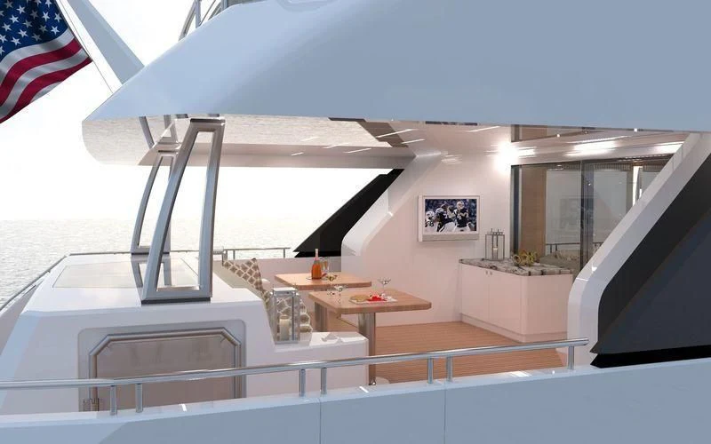 a room with a table and chairs aboard VOYAGER Yacht for Sale