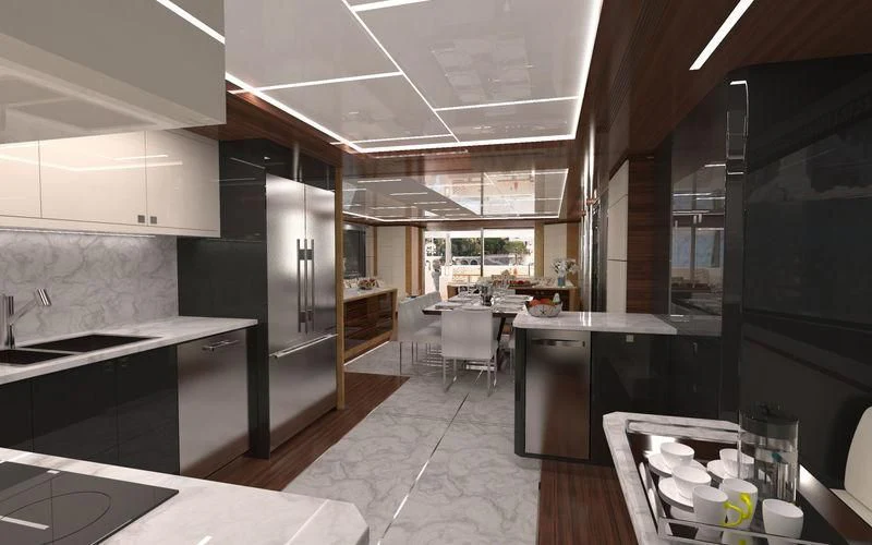 a kitchen with a large refrigerator aboard VOYAGER Yacht for Sale