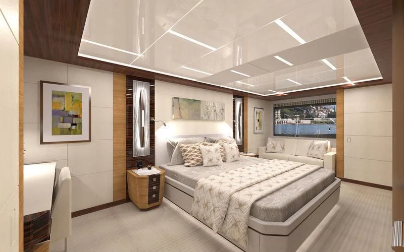 a bedroom with a large bed aboard VOYAGER Yacht for Sale