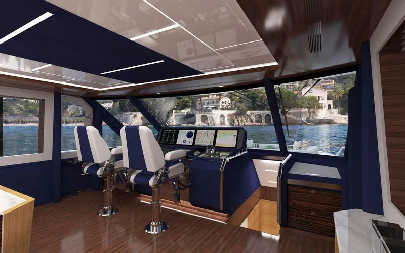 a room with a table and chairs aboard VOYAGER Yacht for Sale