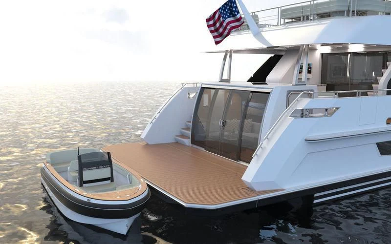 a boat and a boat on a beach aboard VOYAGER Yacht for Sale