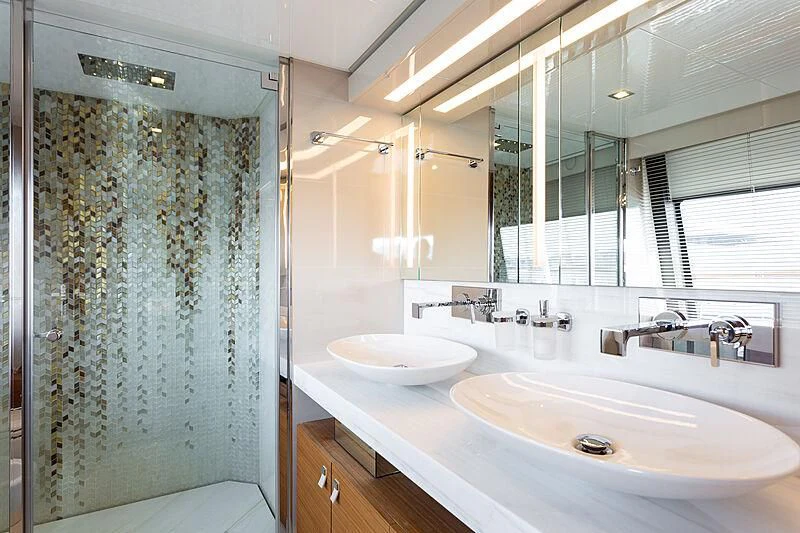 a bathroom with a sink and a shower aboard MIRA 1 Yacht for Sale