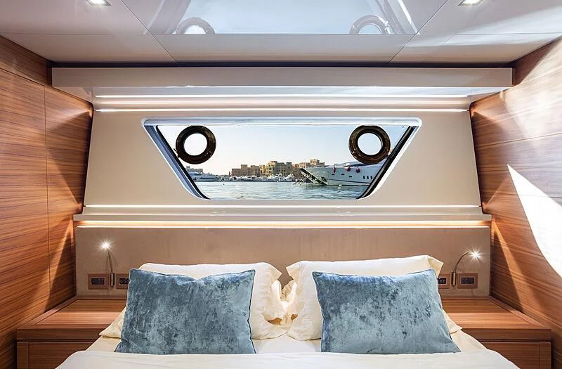 a bed with a large aquarium aboard MIRA 1 Yacht for Sale