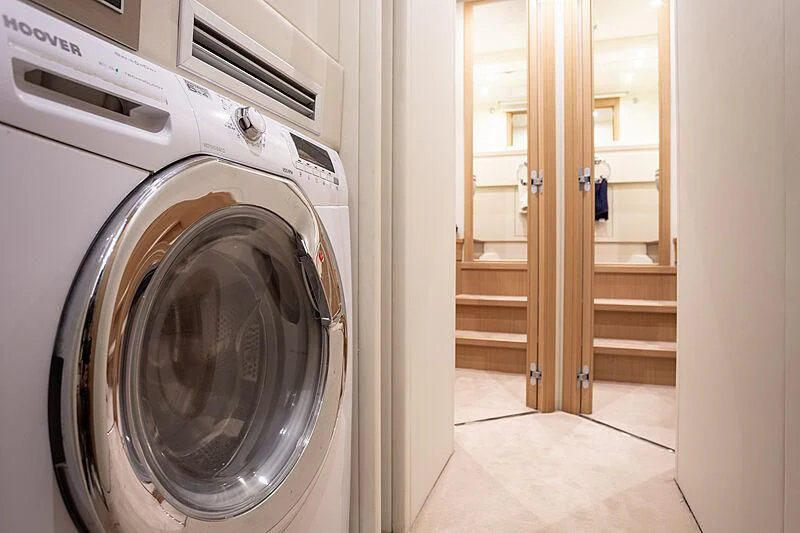a washing machine in a room aboard MIRA 1 Yacht for Sale