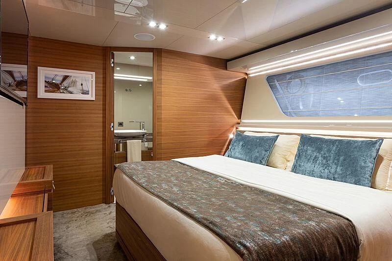 a bedroom with a bed aboard MIRA 1 Yacht for Sale