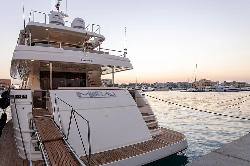 a boat docked at a pier aboard MIRA 1 Yacht for Sale