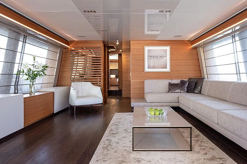 a living room with a couch and a coffee table aboard MIRA 1 Yacht for Sale
