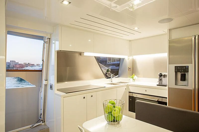 a kitchen with a glass door aboard MIRA 1 Yacht for Sale