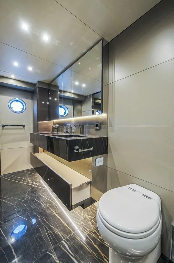 a bathroom with a glass shower aboard ONYX 87/01 Yacht for Sale
