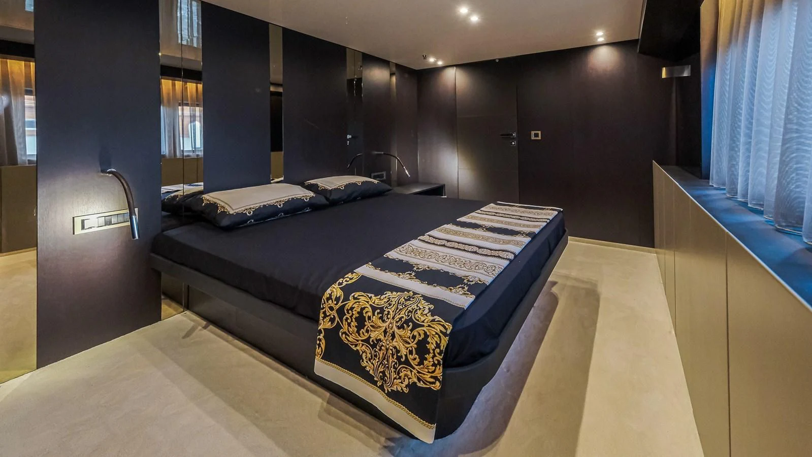 a room with a bed and a window aboard ONYX 87/01 Yacht for Sale