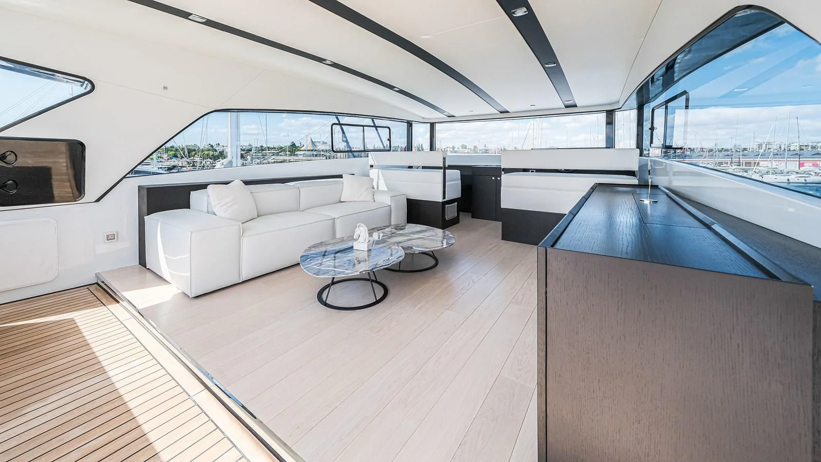 a room with a couch and a pool table aboard ONYX 87/01 Yacht for Sale