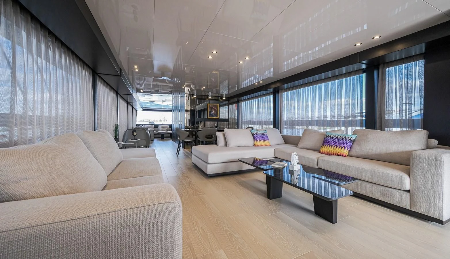 a living room with a couch and a table aboard ONYX 87/01 Yacht for Sale
