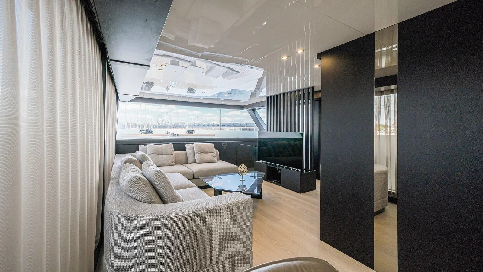 a room with a couch and a tv aboard ONYX 87/01 Yacht for Sale