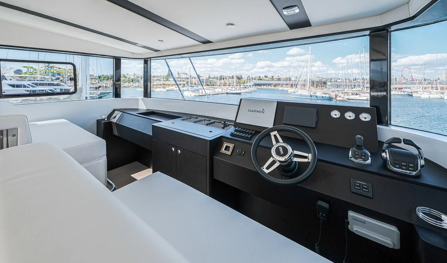 inside of a vehicle with a large window overlooking a city aboard ONYX 87/01 Yacht for Sale