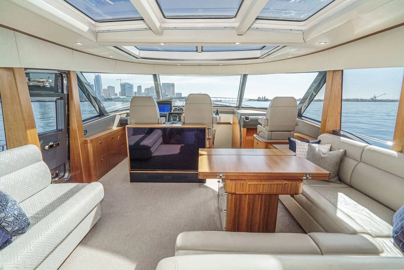 inside of a vehicle with a table and chairs aboard VALENCIA Yacht for Sale