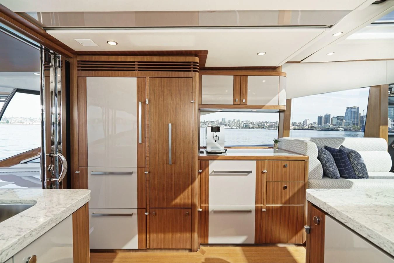 a kitchen with a bed and a sink aboard VALENCIA Yacht for Sale